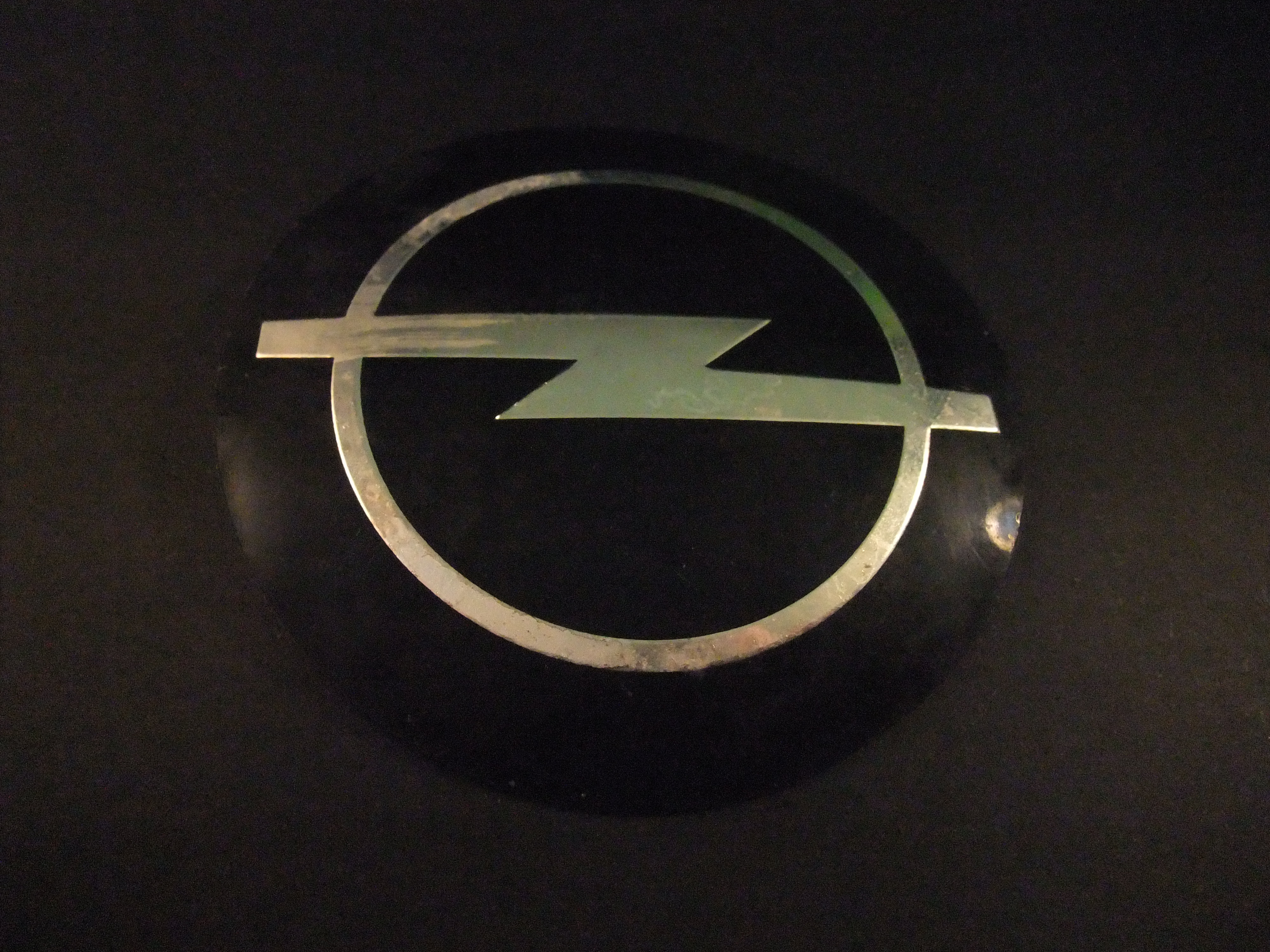 Opel origineel auto logo ( zwart-zilverkleurig) embleem
